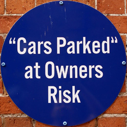 Our editors explain when and how to use double and single quotation marks properly. A large blue sign that reads ""Cars Parked" at Owners Risk;" this shows the incorrect usage of double and single quotation marks.
