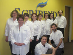 Scribendi.com's welcoming corporate culture. Scribendi.com staff standing at company headquarters; demonstrates flexibile and creative corporate culture.