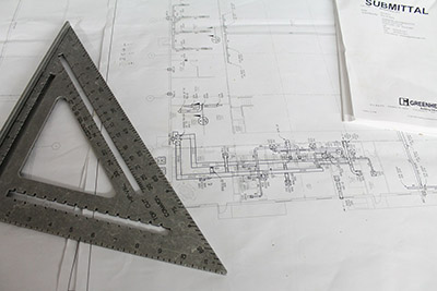 Construction blueprints on a table.